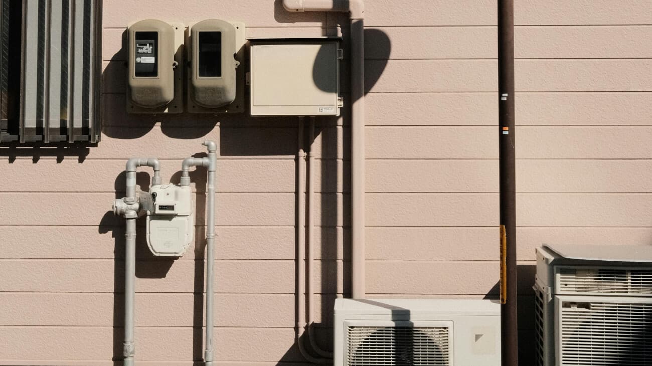A Leading Building Management Firm — 50% Cost Reduction and Proven CO₂ Savings — From Existing Meters, Without Replacing One